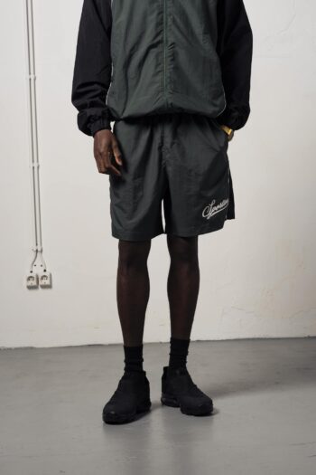 a model with a Open Track Suit Shorts of Goodies-Sportive