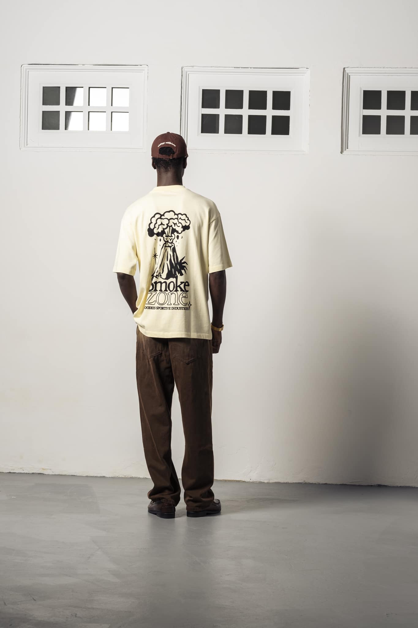 2-SZBT26 a model with a Smoke Zone Butter Tee of Goodies-Sportive