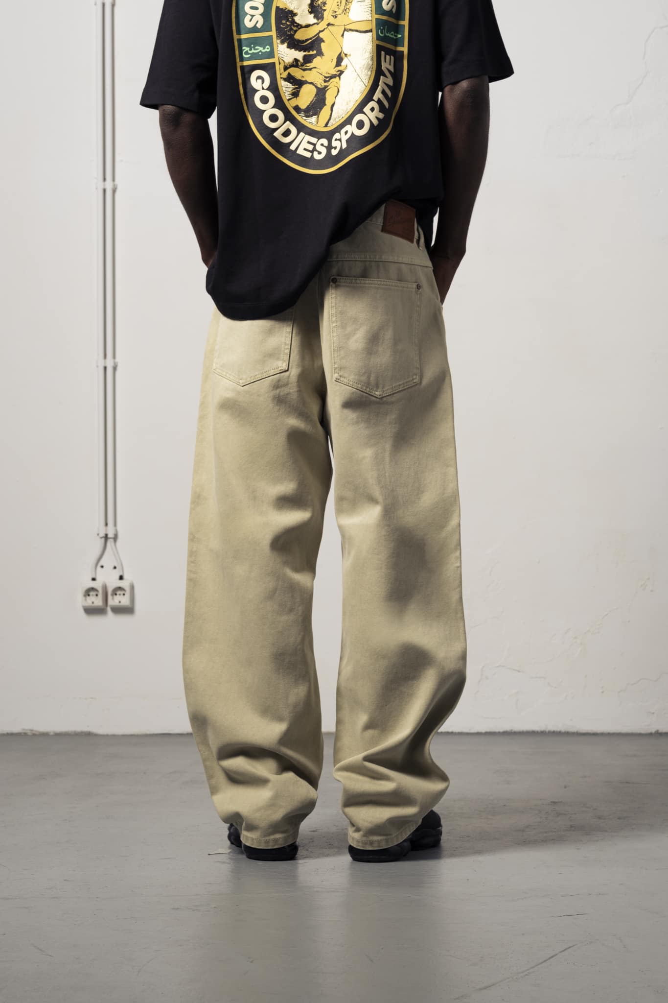2-WLKP26 a model with a Wide Leg Khaki Pants of Goodies-Sportive