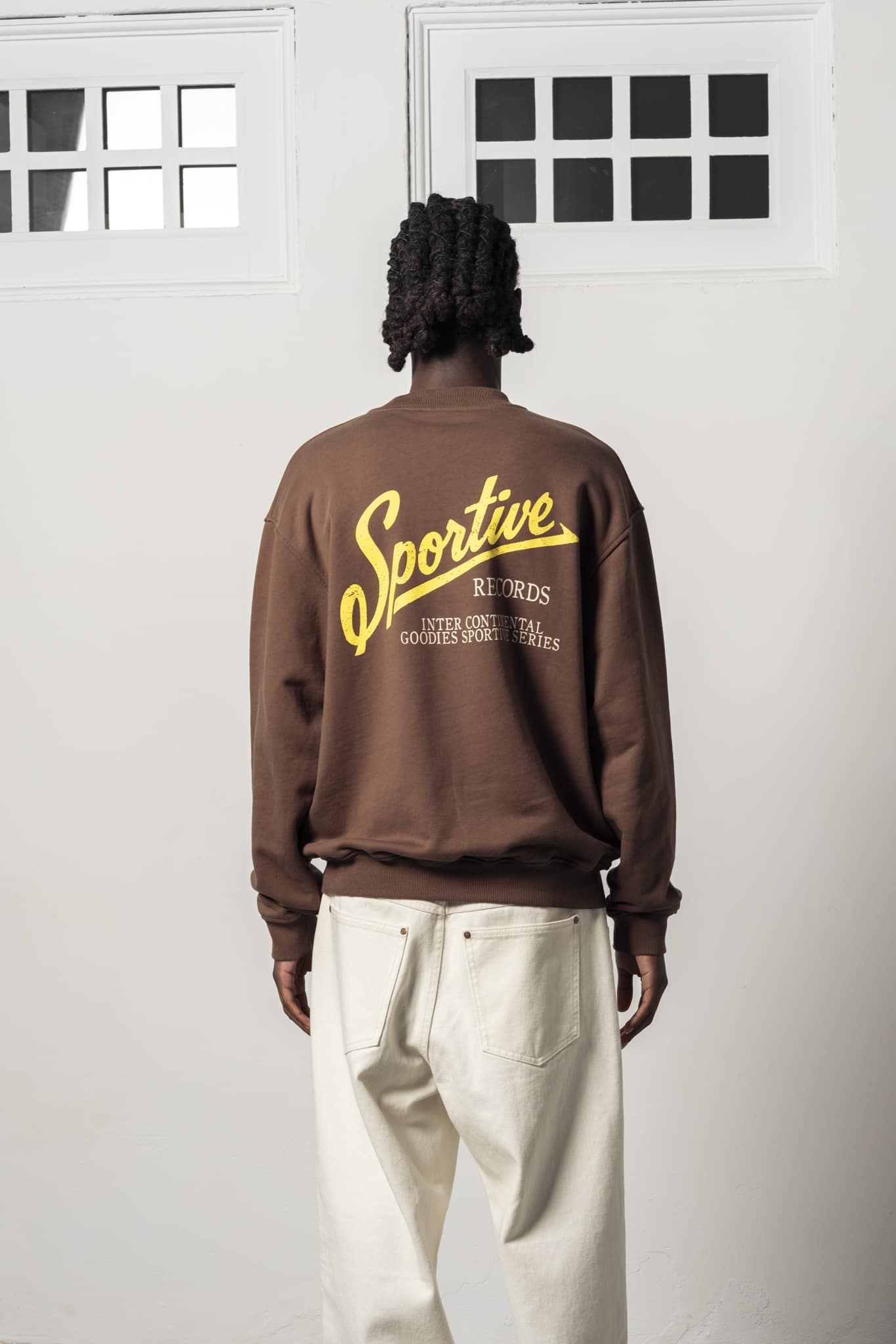 3-ICC26 a model with a Intercontinental Brown Crewneck of Goodies-Sportive