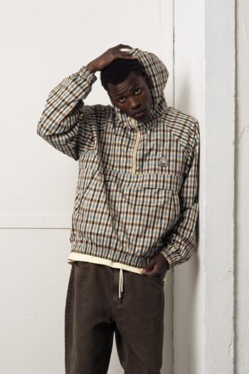 A model with Off Season Checks Anorak by Goodies Sportive