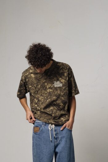 A model with Fake Tree Tee by Goodies Sportive