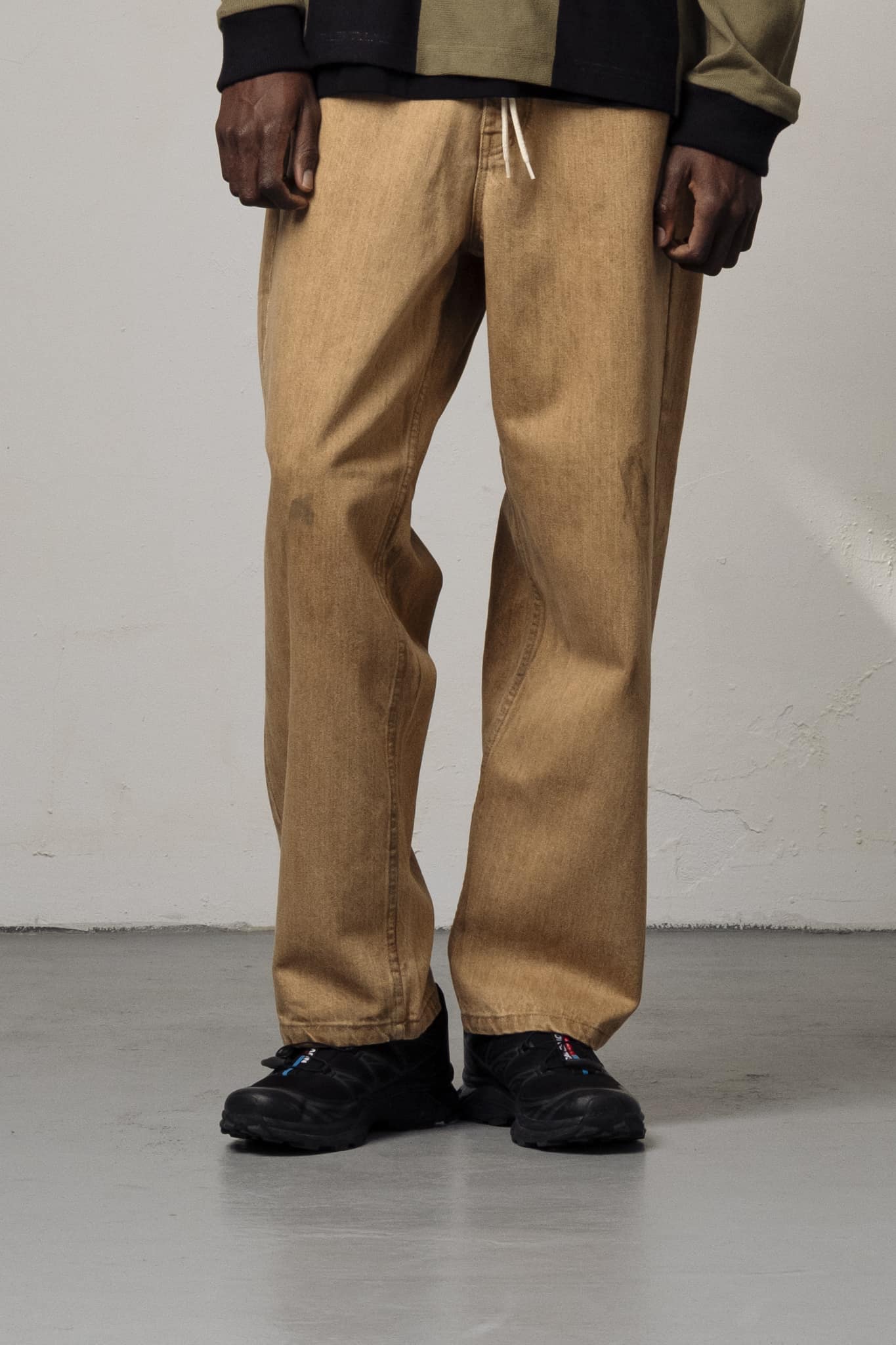 22-CAMEL DIRTY PANTS � CDP26-002 A model with Camel Dirty Pants by Goodies Sportive