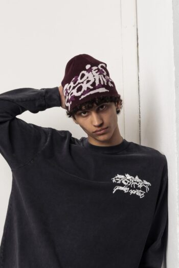 A model with Athletic Bordeaux Beanie by Goodies Sportive