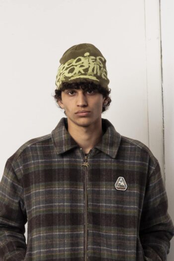 A model with Athletic Green Beanie by Goodies Sportive