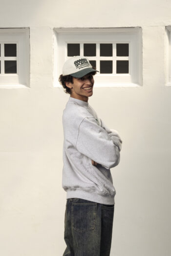 A model with Nys Cap by Goodies Sportive