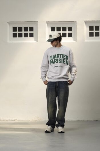 A model with Qp Vigore Crewneck by Goodies Sportive
