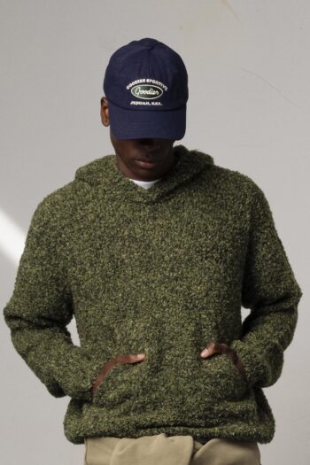 A model with Navy And Green Cap by Goodies Sportive